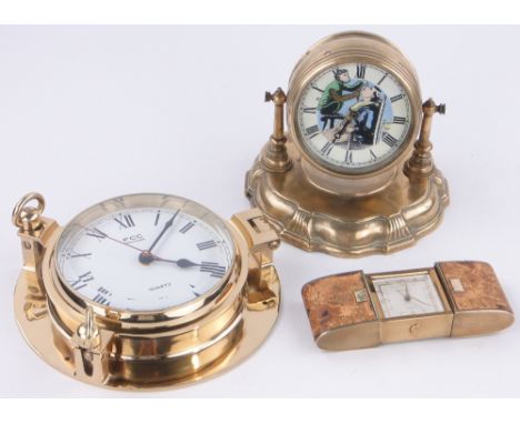 3 various clocks,
comprising a brass cased barber shop automaton clock, height 6.5", a brass ships style quartz bulkhead cloc