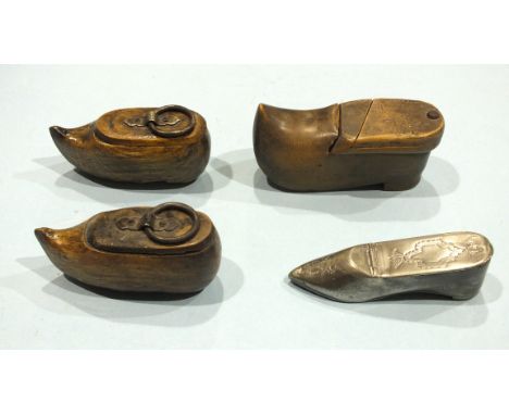 A white metal snuff box in the form of a shoe, marked Hancock &amp; Jessop, and three wooden clog snuff boxes, (4).