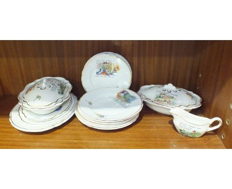 A collection of doll's ceramic dinnerware transfer-printed with nursery rhymes, approximately eighteen pieces, printed gold s