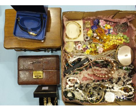 A gold-plated hinged bangle, a quantity of costume jewellery and watches and one leather and two wooden jewellery boxes.