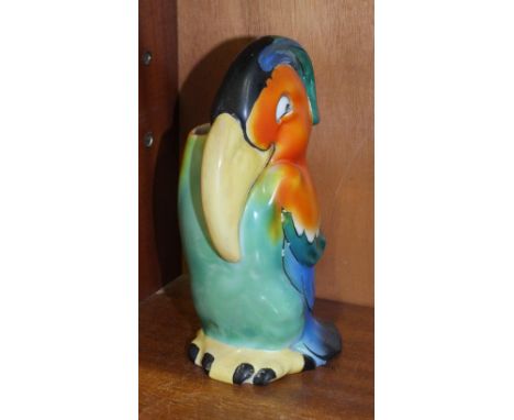 A 1920's-30's Goebel spill vase in the form of a brightly-coloured stylised toucan, 17.5cm high, factory marks and stamped VT