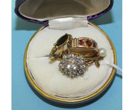 A 9ct rose gold gypsy ring set three garnets, size I, a 9ct gold white stone cluster ring, size P½, in Ratners box, and two o