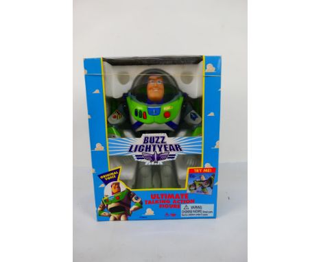 Thinkway Toys - A boxed Thinkway Toys,  Disney Toy Story 'Buzz Lightyear - Ultimate Talking Action Figure'. The figure appear