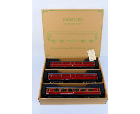 Darstaed - A boxed Darstead O gauge Set C LMS period II passenger coach set. The set appears to be in Mint condition, housed 