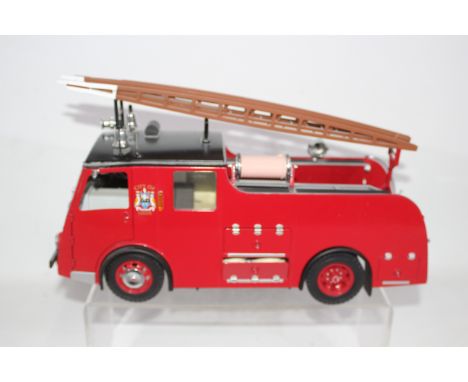 Original Classics - A boxed Dennis F8 City of Leeds Fire Engine in 1:18 scale. It is dusty from display and has some small ar