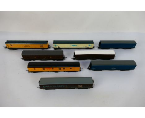 Lima - 8 x unboxed OO gauge wagons including parcel van in Enparts livery, utility van in Theakstons livery, a parcel van in 