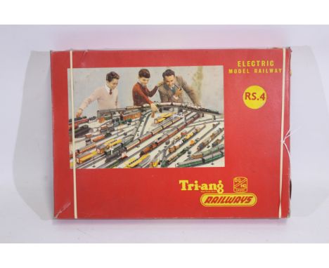 Tri-ang - A boxed Tri-ang RS.4 electric OO gauge train set. Includes a Class 3F Jinty 0-6-0 tank engine with 2 x wagons and a