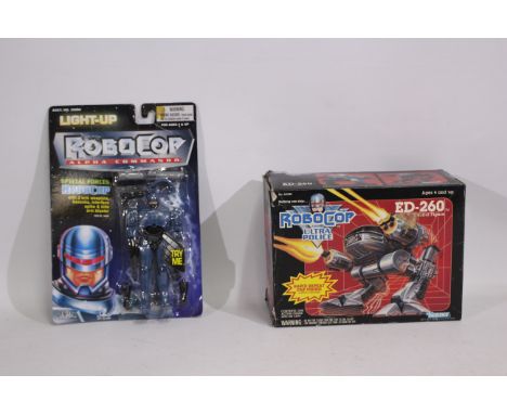 Robocop - ED260 - Kenner - Toy Line. A carded #39880 Robocop Light Up Alpha Command from Toy Island 1998. Item appears Mint w