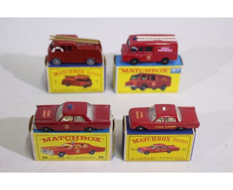 Matchbox - 4 x boxed Fire Service vehicles, a Merryweather Marquis III with the rarer grey plastic wheels and tan ladder # No