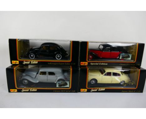 Maisto - Four boxed diecast 1:18 scale 'Special Edition' model cars from Maisto. Lot consists Maisto Citroen 15CV 6 Cyl (x2);