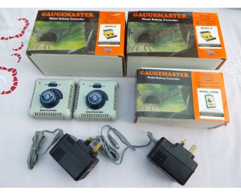 Model Railways Power Controllers - 2 x Gaugemaster Model D in original boxes with orange sleeves, a Gaugemaster Combi in orig