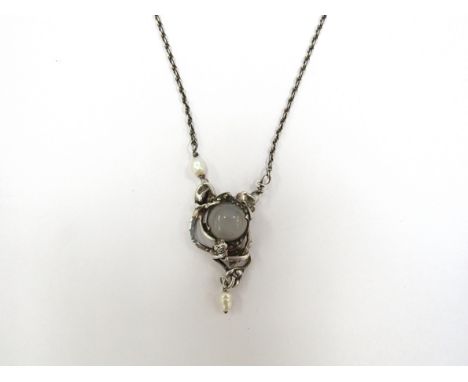 A Cabochon moonstone pendant in a contemporary silver and natural pearl setting 