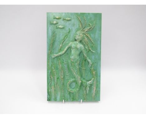 A vintage decorative wall hanging with mermaid design in relief. 33cm x 20.5cm