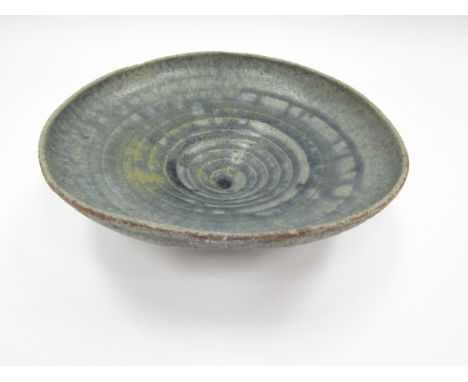 IAN GODFREY (1942-1992): A studio pottery stoneware bowl, blue mottled glaze, unmarked, 6cm high x 20cm diameter 