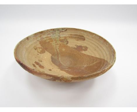 IAN GODFREY (1942-1992): A studio pottery stoneware bowl, biscuit and ash glazes, unmarked, 7cm high x 21.5cm diameter 