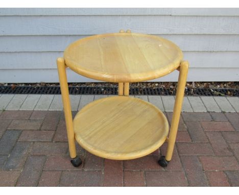 A light beech two tiered folding trolley, removable trays, lazy Susan top