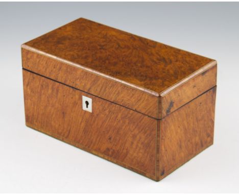 A mid 19th Century tea caddy, hand crafted in burr eucalyptus edged with tulip wood.