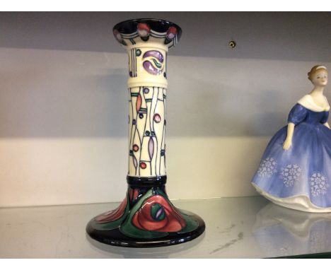A Moorcroft candlestick.