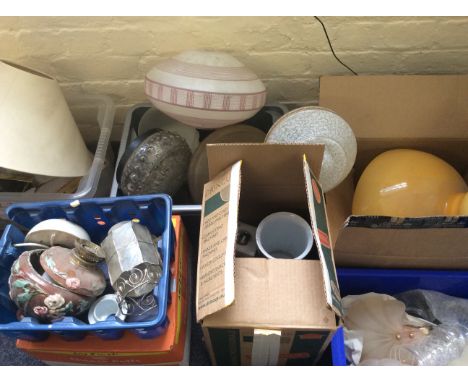 Approximately 15 boxes of various items to include light shades, pottery etc.