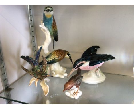 Four Goebel and Hummel birds.