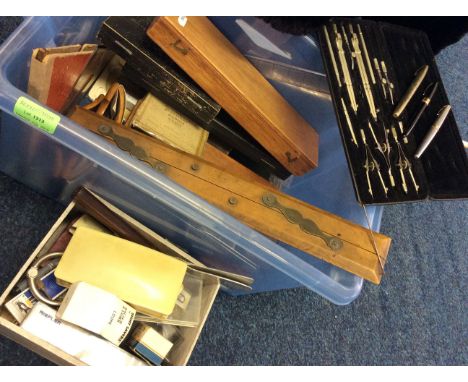 Lot to include various drawing and architectural implements including a parallel ruler, an ink roller, geometry set, three pe