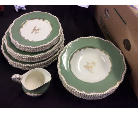 Parts of a royal Worcester dinner service including jug and various plates.