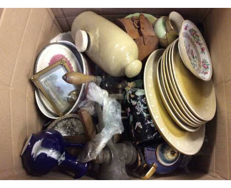 A box of various ceramic plates, glass vases, an embroidered picture and assorted glasses.