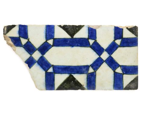 A DAMASCUS TILE FRAGMENT, OTTOMAN SYRIA, 18TH CENTURY underglaze painted fritware, with geometric design imitating inlay work