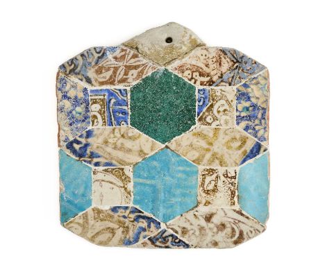 A SMALL TILE MOSAIC PANEL COMPOSED OF EARLY ISLAMIC TILE FRAGMENTS, PERSIA, MOSTLY 13TH CENTURY comprising Kashan moulded, lu