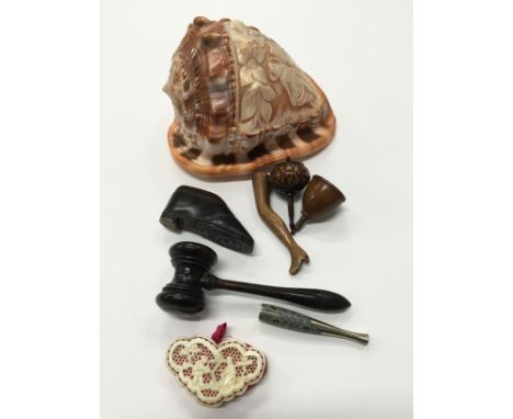 TREEN: A treen snuff box modelled as a boot, a pipe tamper modelled as a ladies leg, thimble holder, a Tunbridge spinning top