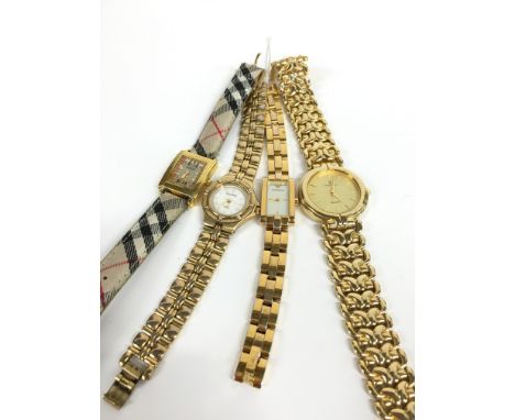 A ladies' gold plated cased Burberry wristwatch, square dial, Burberry pattern dial, baton numerals with Burberry motif to ce