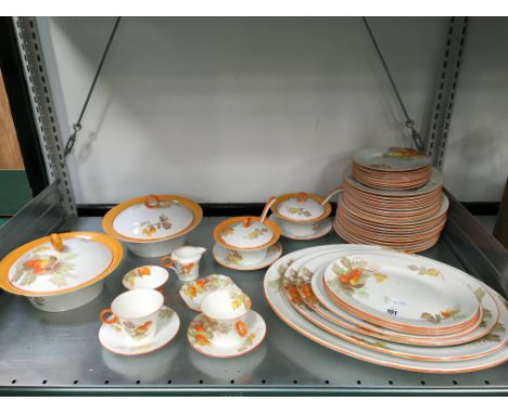 The residue of a Shelley china dinner service decorated in the Cape Gooseberry pattern together with the residue of a matchin