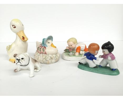 A Beswick china duck together with a Royal Albert Beatrix Potter figure: Jemima Puddleduck, Royal Addersley Mabel Lucie Attwe