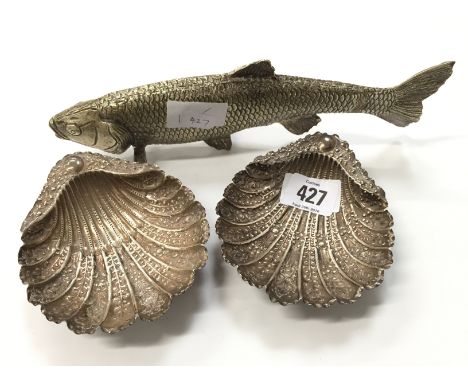 A pair of Victorian shell shaped embossed butter dishes by Atkin Bros., Sheffield 1891 (132.6 grams) together with a silver p