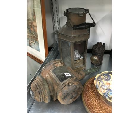 A brass cased signal lamp together with a 19th century metal carriage lamp and one other (all af).