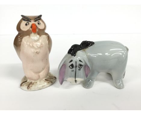 A Beswick china Walt Disney model of an owl together with another: Eeyore