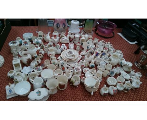 A large collection of Carlton Ware and Goss commemorative china including coal scuttles, cheese dishes, sedan chair, for anim