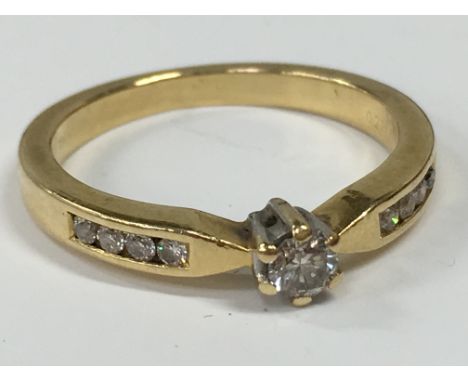 An 18 carat gold single stone solitaire diamond ring (4.1 grams).