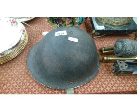 A WWII tin helmet.