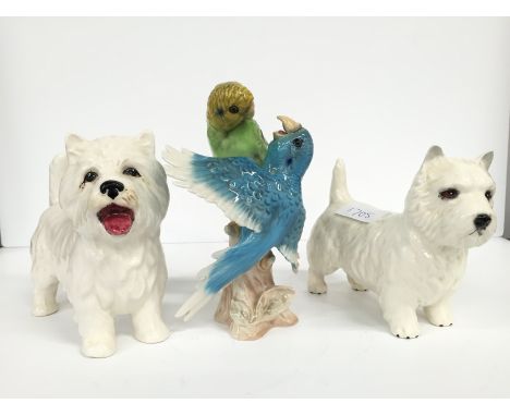 A Goebel china study modelled as blue and green budgerigars, CV95 together with two china terrier dogs.