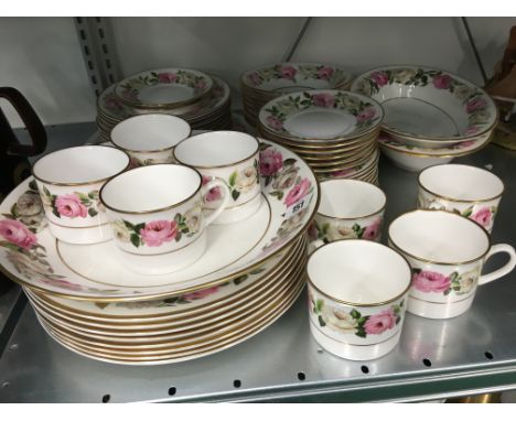 A Royal Worcester Royal Garden Elgar pattern coffee and dinner set consisting of 11 dinner plates, 8 side plates, 8 bowls, 6 