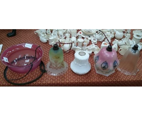 Five various coloured glass 1920's lamp shades.