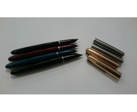 Four Parker pens in black, red and blue cases with arrow clips.