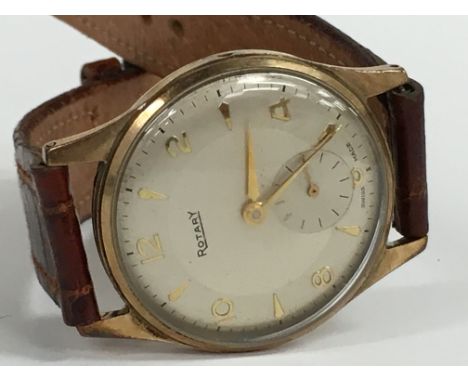 A gentleman's 9 carat gold cased Rotary wristwatch, silver dial, Arabic and baton numerals with subsidiary dial on brown leat