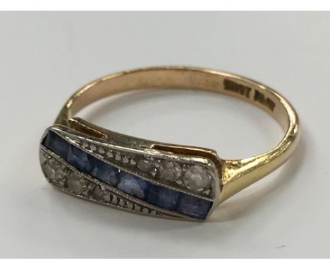 An 18 carat gold Art Deco style platinum and diamond ring.