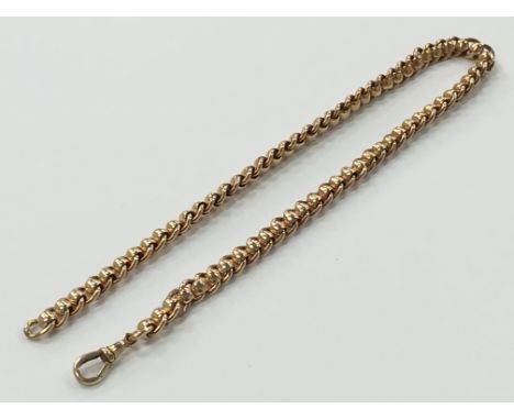 A 9 carat gold roller curb Albert chain (total weight 47 grams).