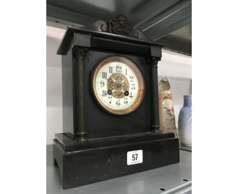 A Victorian slate and brass mounted drawing room clock with enamelled and gilt metal chapter ring, retailed by Goldsmiths Lim