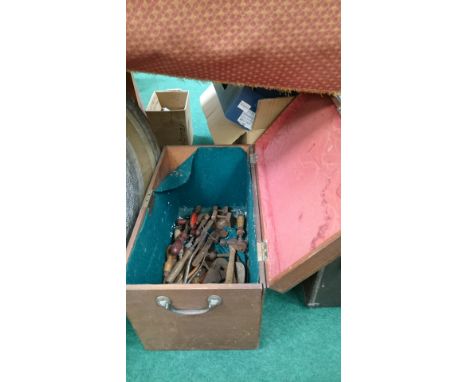 A mahogany box containing a quantity of tools.