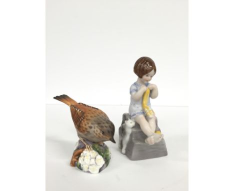 A Royal Worcester china figure: Saturdays' Girl together with a Royal Worcester Hedge Sparrow (3333) 