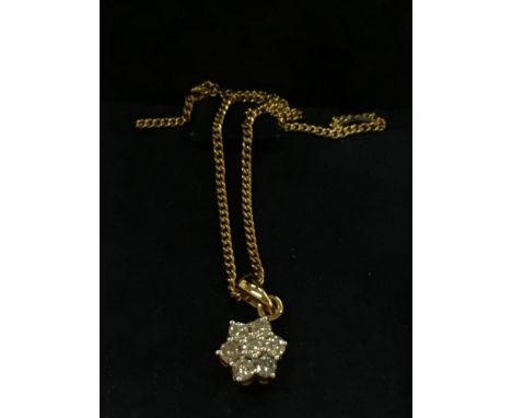 An 18 carat gold diamond cluster pendant on a 9 carat gold chain.